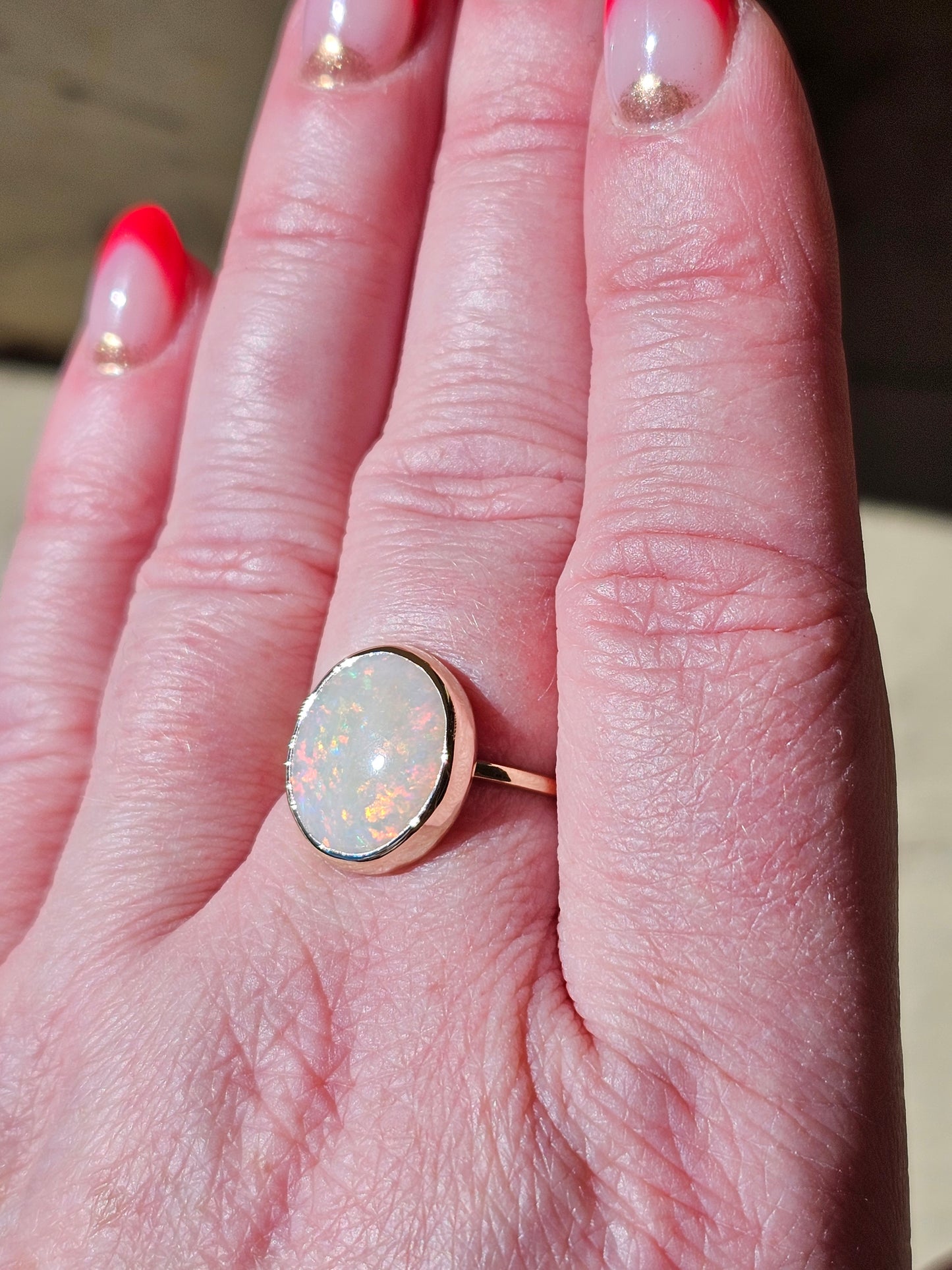 4.24 Carat Fiery White Opal in Yellow Gold