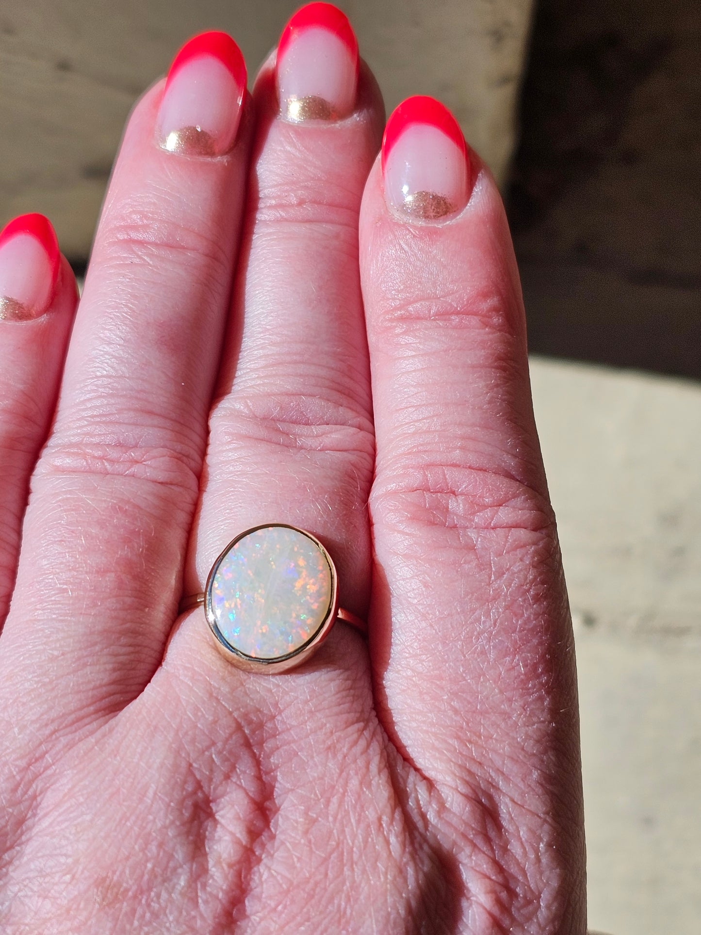 4.24 Carat Fiery White Opal in Yellow Gold