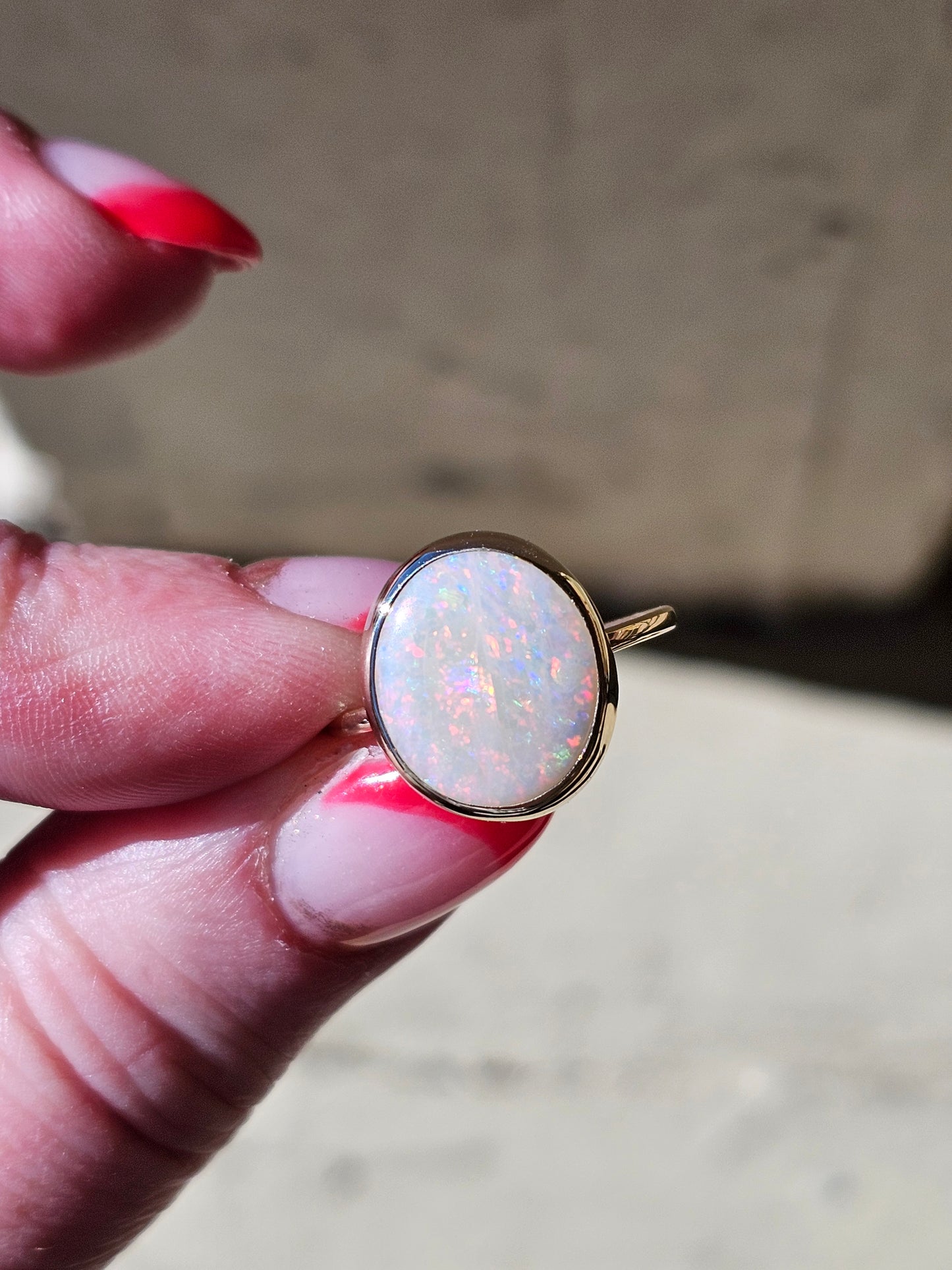 4.24 Carat Fiery White Opal in Yellow Gold