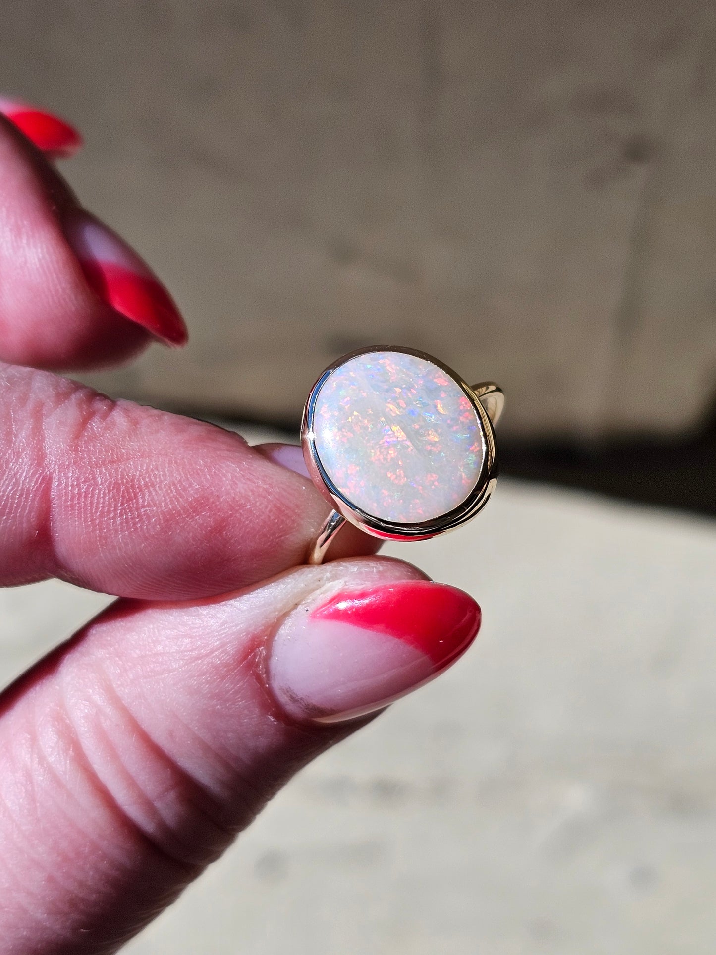 4.24 Carat Fiery White Opal in Yellow Gold