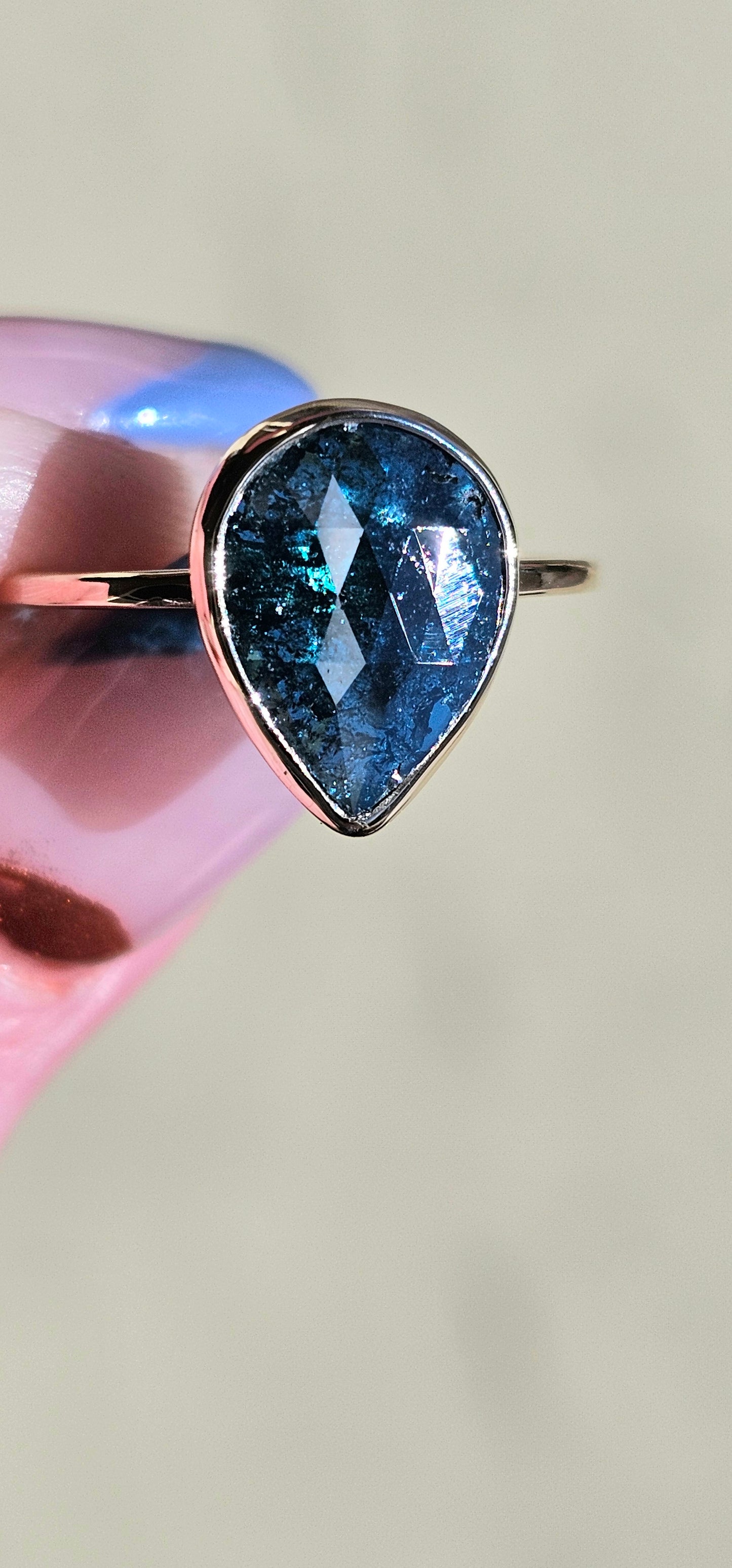 Pear shaped, 1.48ct, rough cut Blue Diamond set in 14K yellow gold - size 6